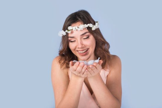 cheerful-young-lady-with-fresh-flowers-head-holding-petals_23-2148054874 (2)