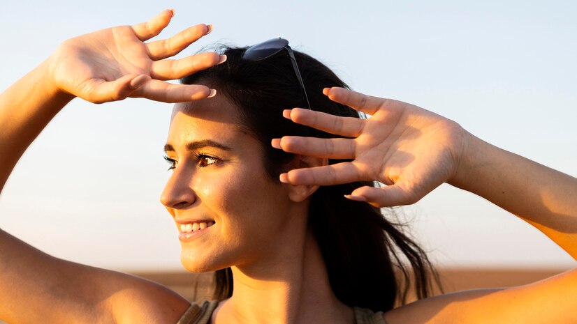 smiley-woman-outdoors-sun-covering-her-face_23-2148648085